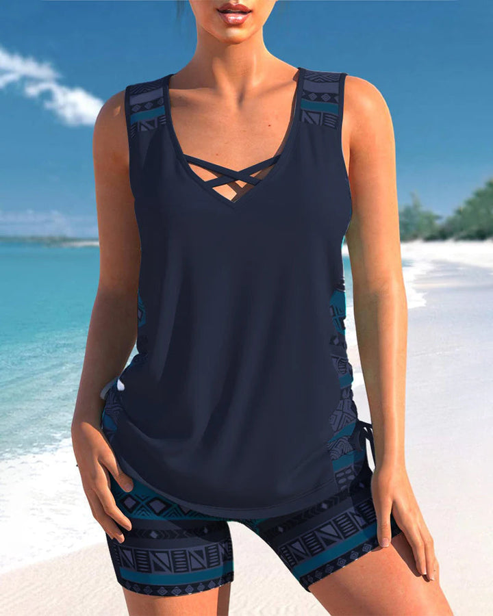 Perfect women's summer beachwear: criss cross neck printed tankini two-piece swimsuit for vacation.