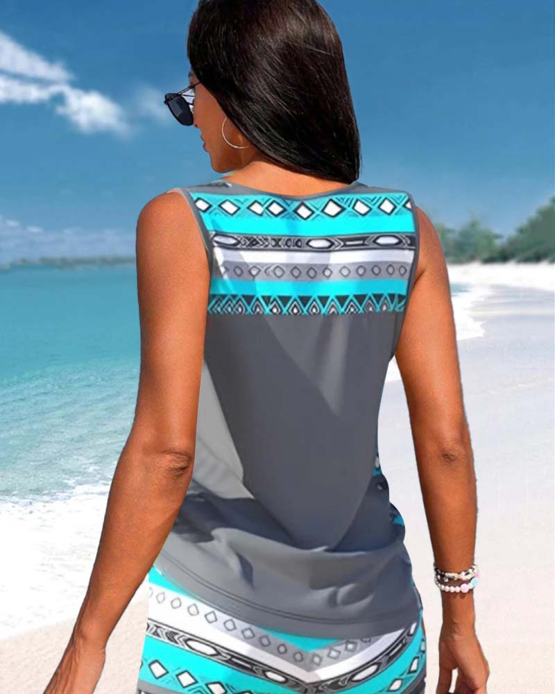 Elegant two-piece tankini swimwear set for women with a unique criss cross printed design.