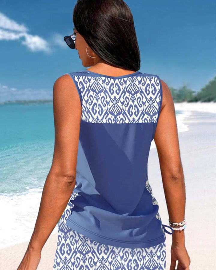 Comfortable women's two-piece tankini swimwear with a stylish criss cross neck & vibrant print.