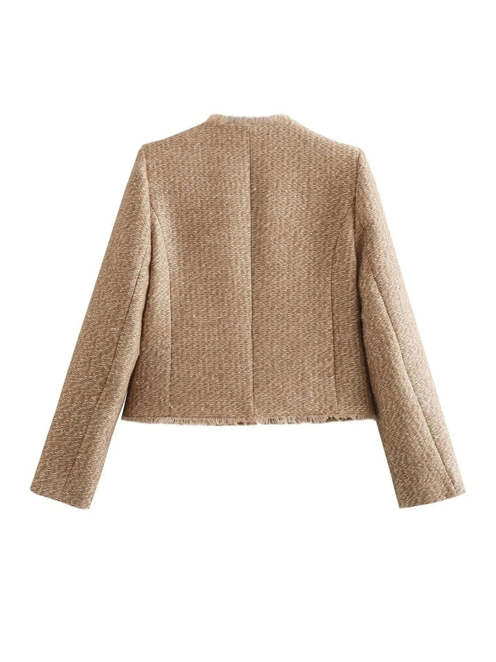 Sophisticated women's short button-front blazer, tailored for elegant layering and modern style.