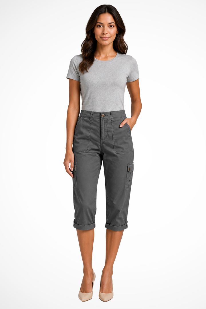 Fashionable women's cropped cargo trousers with roll-up hem, ideal for casual and spring outfits.
