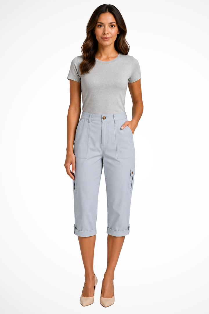 Trendy women's cropped cargo pants, featuring a roll-up hem, perfect for casual spring/summer looks.