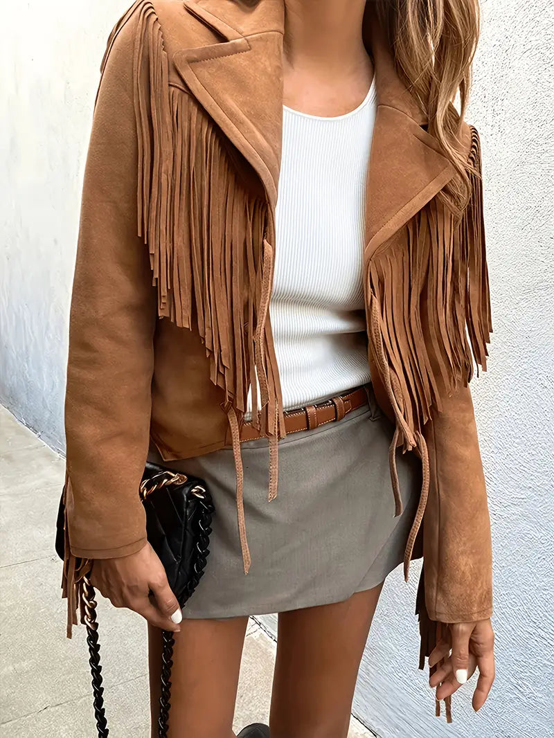 Women's cropped fringe jacket, perfect for a bohemian fall fashion statement. Stylish outerwear.