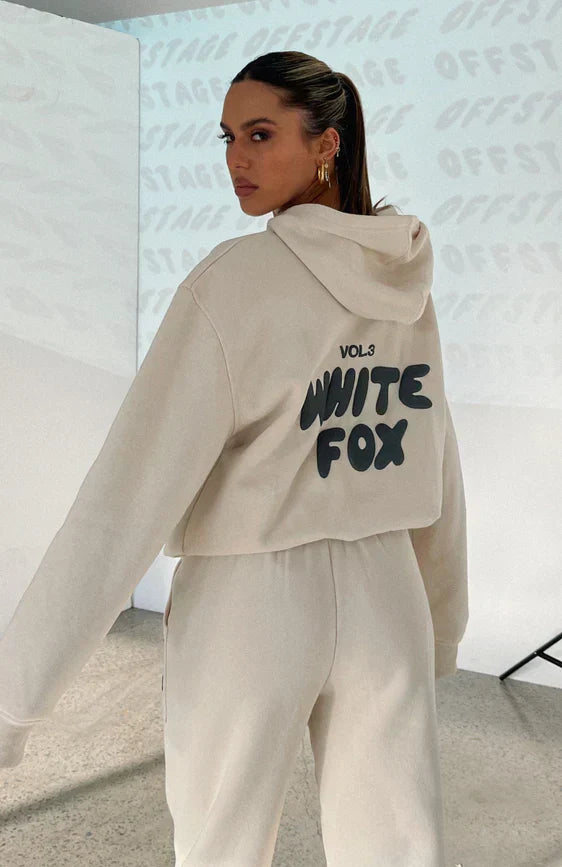 Women's cropped hoodie & jogger tracksuit set, comfortable loungewear with unique back print.