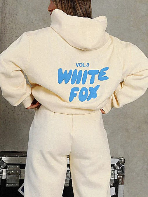 Women's cropped athleisure tracksuit, comfortable hooded set, great for casual wear, unique back print.