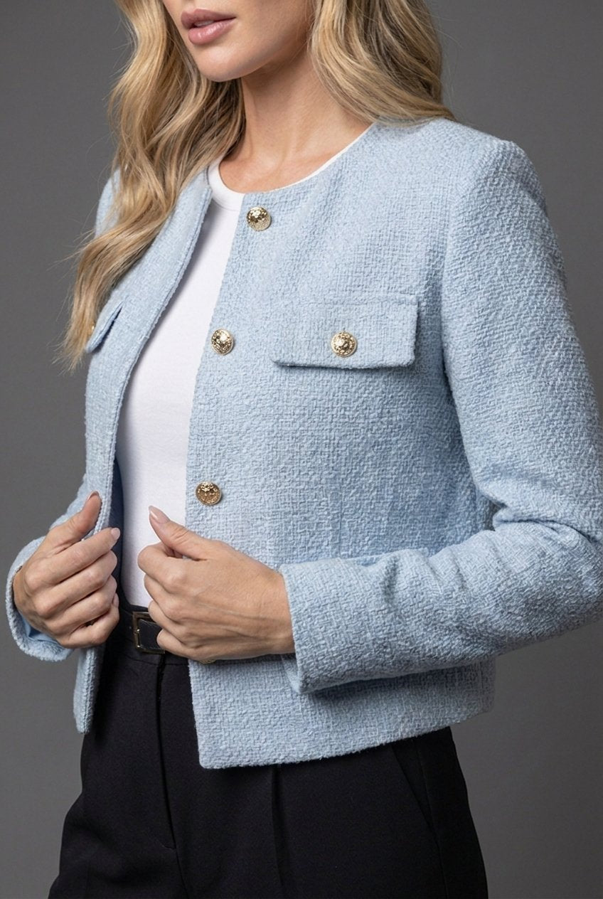 Chic women's round neck cropped blazer jacket with stylish buttons & patch pockets. Versatile for spring fashion.