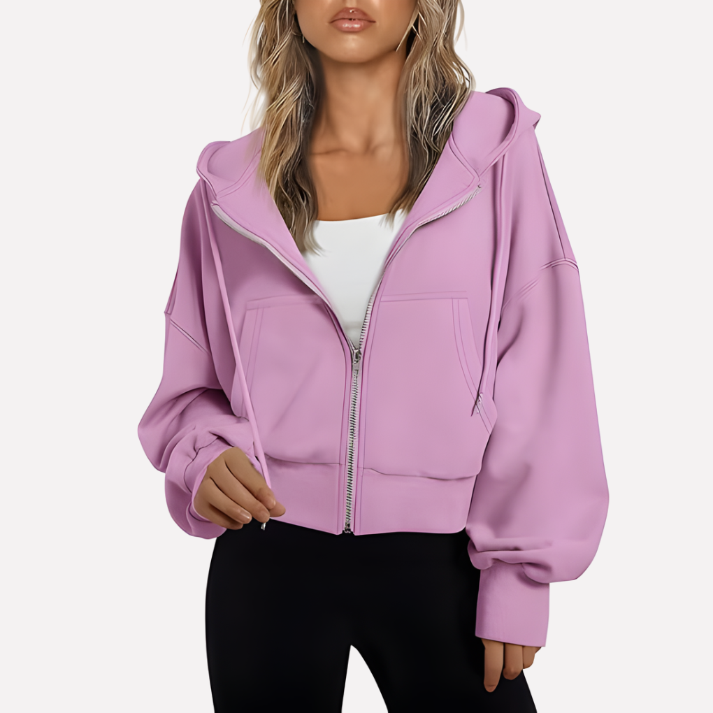 Fashion-forward women's cropped zip hoodie, an essential layering jacket with drawstring.