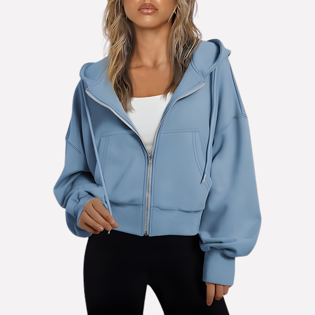 Modern relaxed fit cropped zip hoodie for women, ideal as a versatile layering top.