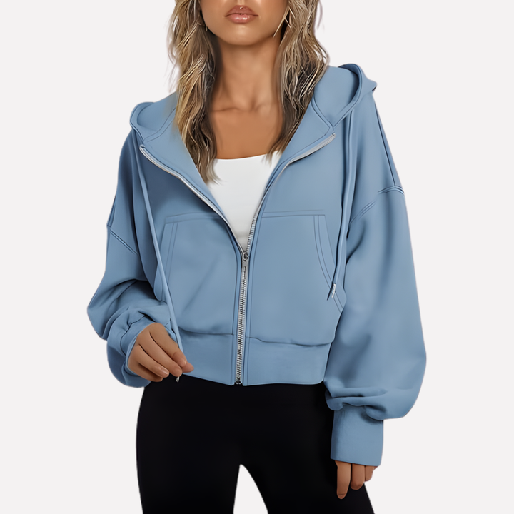 Modern relaxed fit cropped zip hoodie for women, ideal as a versatile layering top.