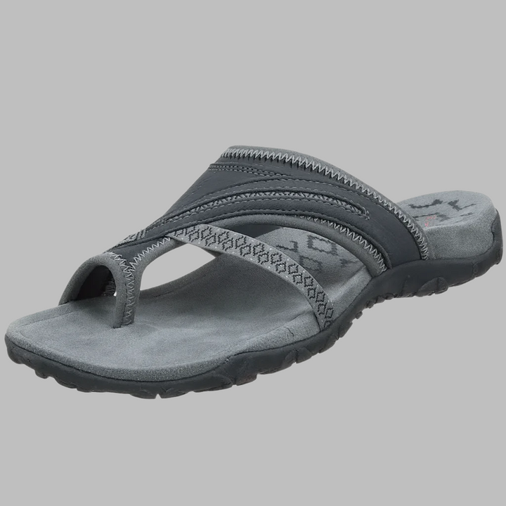 Stylish women's cross strap sandals for summer. Lightweight design perfect for beachwear & casual outfits.