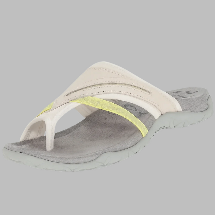 Comfortable women's cross strap sandals. Cushioned sole provides foot support for easy, lightweight summer wear.