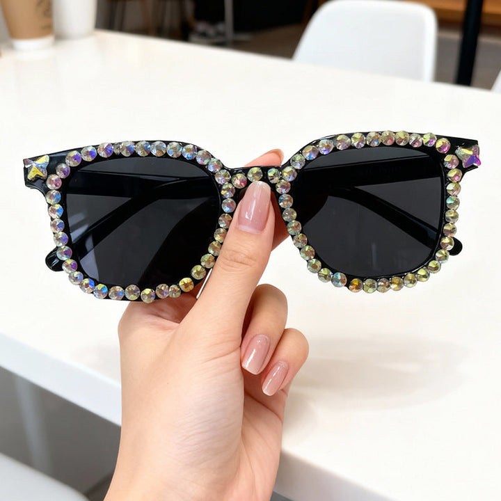 Women's crystal-embellished cat eye sunglasses, chic fashion eyewear with UV protection.