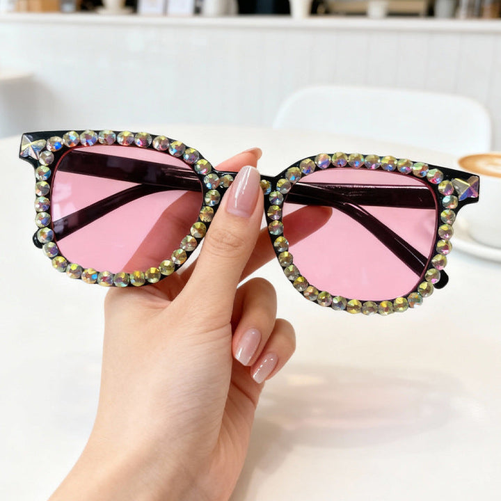 Fashion-forward women's cat eye sunglasses, beautifully embellished with crystals for UV protection.