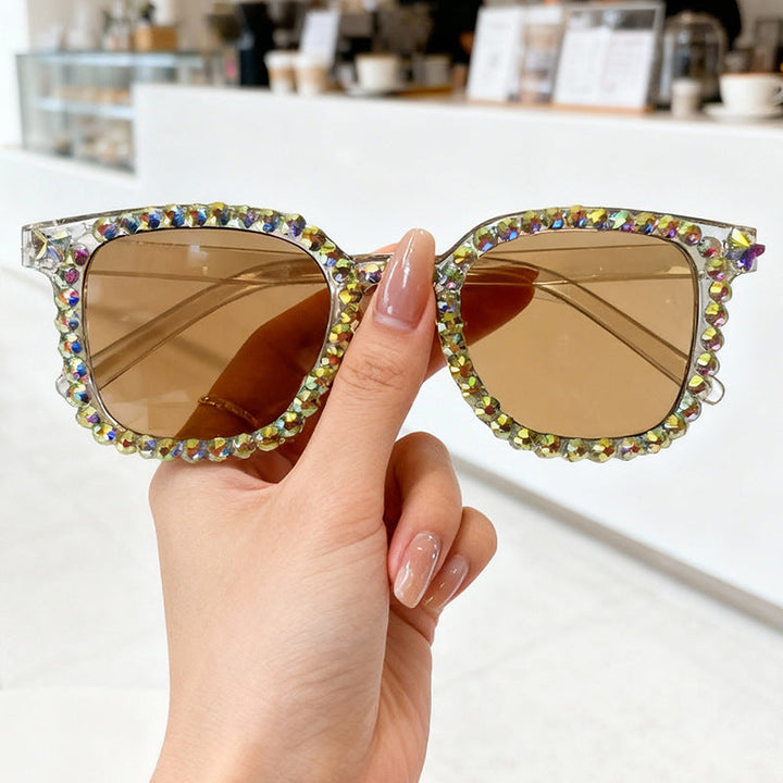 Elegant women's crystal-embellished cat eye sunglasses, providing chic style and essential UV protection.
