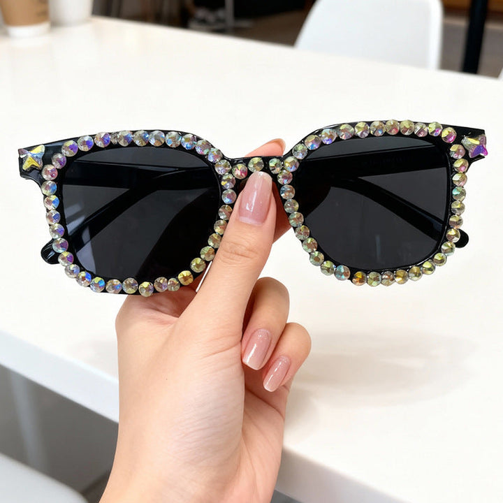 Statement women's crystal cat eye sunglasses, a chic fashion accessory offering stylish UV protection.
