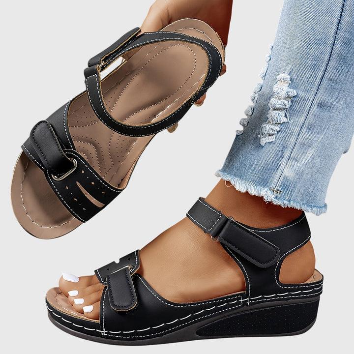 Stylish women's comfort sandals with crystal detail, featuring orthopedic arch support for daily wear.