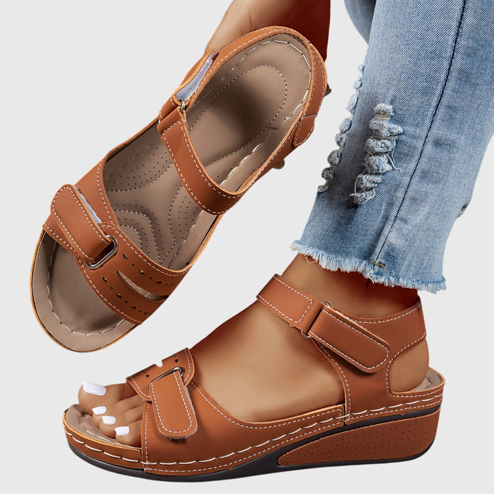 Open-toe slip-on women's sandals, crystal adorned, offering orthopedic comfort and foot support.