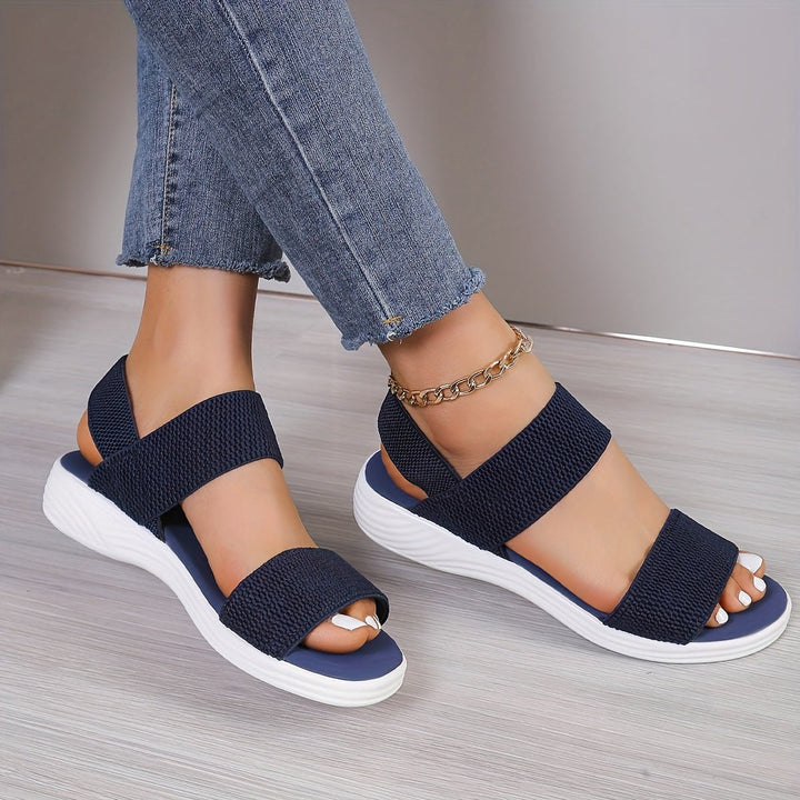 Summer-ready women's cross-strap platform sandals, cushioned for ultimate comfort and casual style.