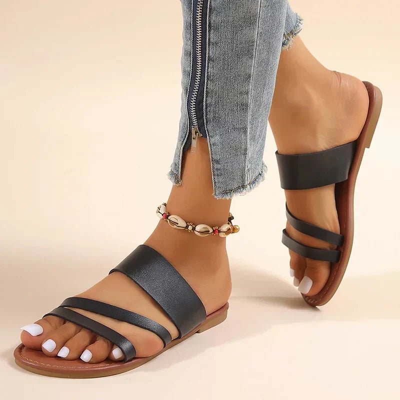 Women's cushioned cross-strap slip-on comfort sandals, ideal for everyday summer wear.