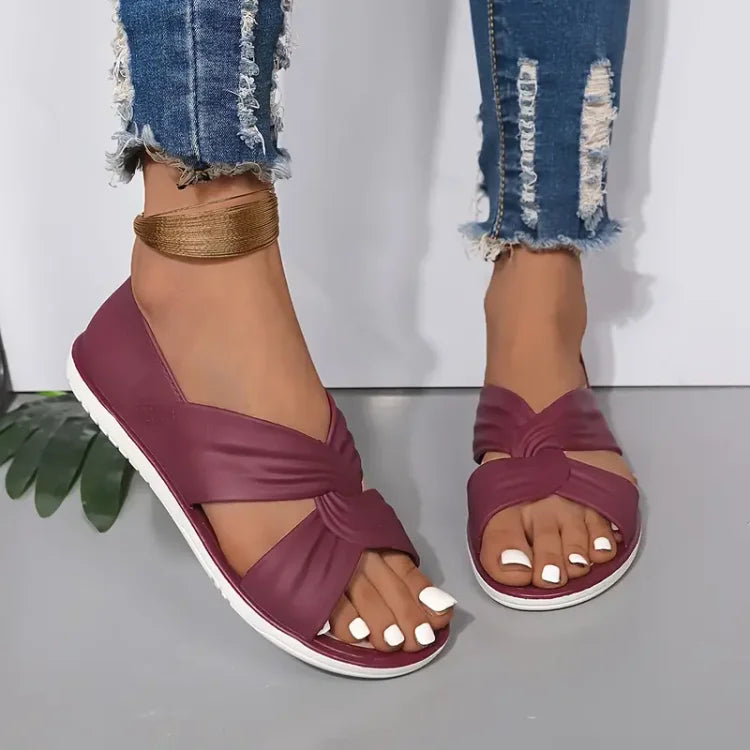 Women's casual crossover sandals, slip-on style, designed for all-day cushioned comfort.