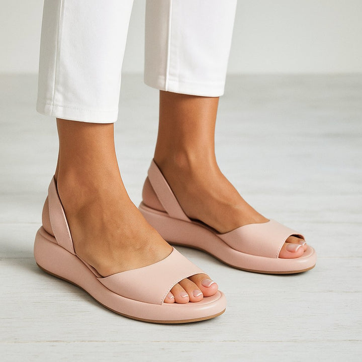 Stylish women's platform sandals with cushioned footbed & secure slingback strap.