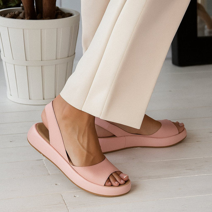 Soft cushioned women's platform sandals, slingback style perfect for warm weather.