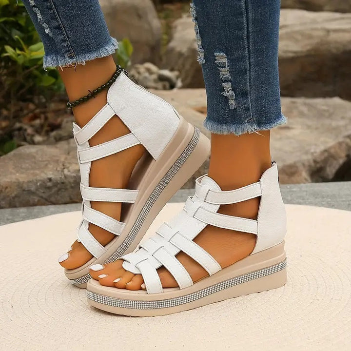 Walk in comfort with women's cushioned slide sandals. Perfect slip-on footwear for summer days.