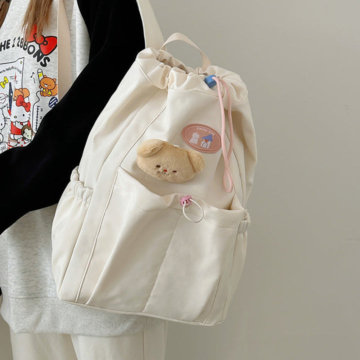 Aesthetic women's drawstring bag, featuring a cute design. Perfect as a casual backpack or everyday carry.
