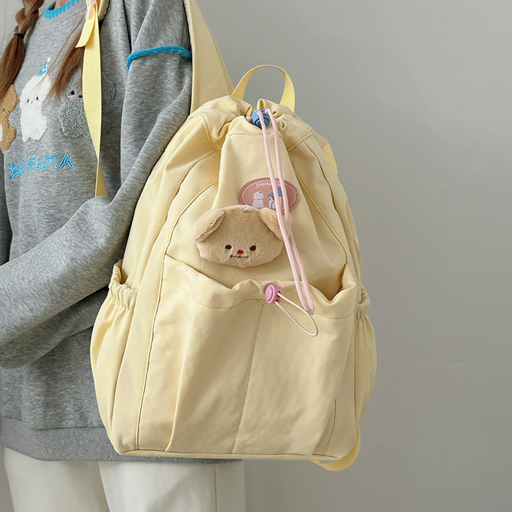 Versatile women's cute aesthetic drawstring backpack for school, travel, or daily casual use. Features spacious design.