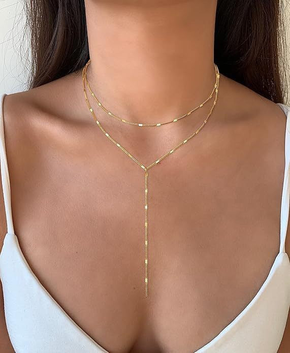 Women's elegant layered Y-chain necklace, a dainty gold jewelry accessory for timeless style.