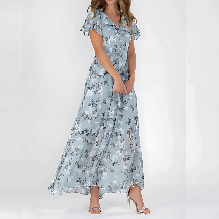 Chic women's summer dress with white daisy floral print. Elegant yet casual, versatile for day or evening wear.