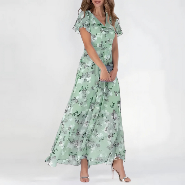 Beautiful women's daisy print floral summer dress. Ideal for spring fashion, garden events, or a chic casual look.