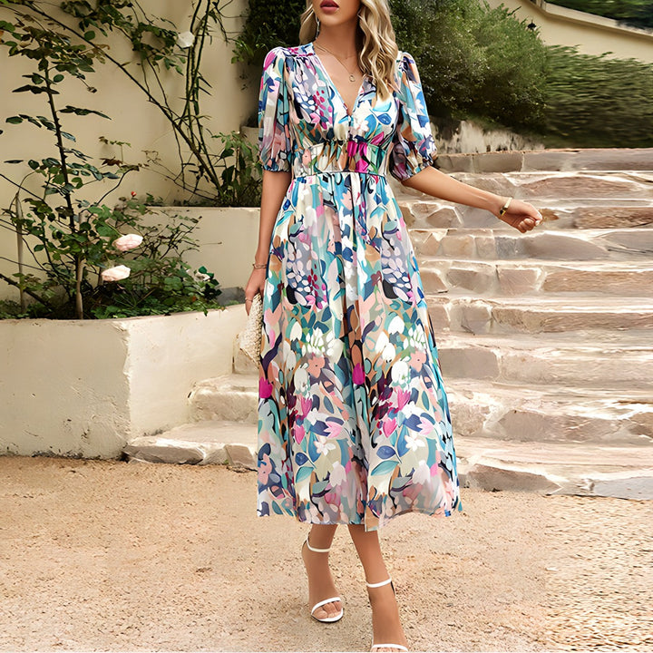 Stylish women's floral midi dress with V-neck & lantern sleeves. Perfect elegant spring & summer party wear.