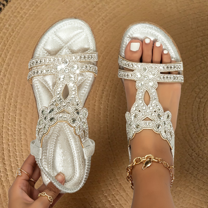 Glamorous women's flat rhinestone sandals, perfect for summer evenings & vacation wear.