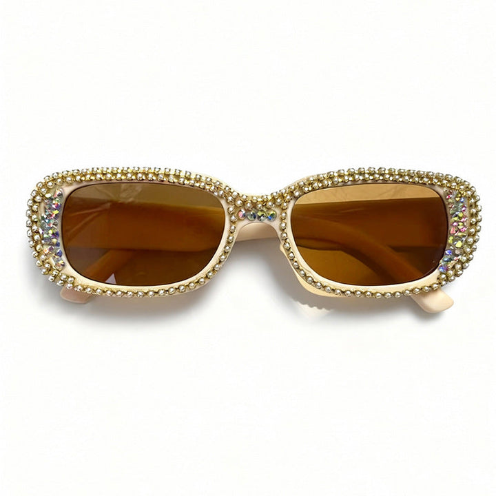 Oversized women's fashion sunglasses featuring intricate rhinestone detail for a glamorous, trendy look.