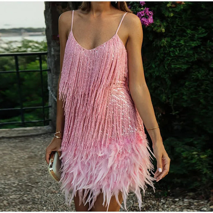 Glamorous women's sequin feather party mini dress with delicate straps, ideal for evening wear.
