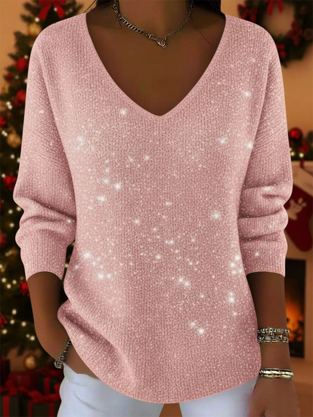 Model wearing a radiant women's sequin V-neck long sleeve blouse, a dazzling dressy top for events.