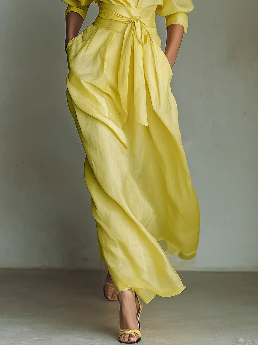 Flowy women's deep V-neck tie-waist maxi shirt dress. A comfortable and elegant choice for any season.