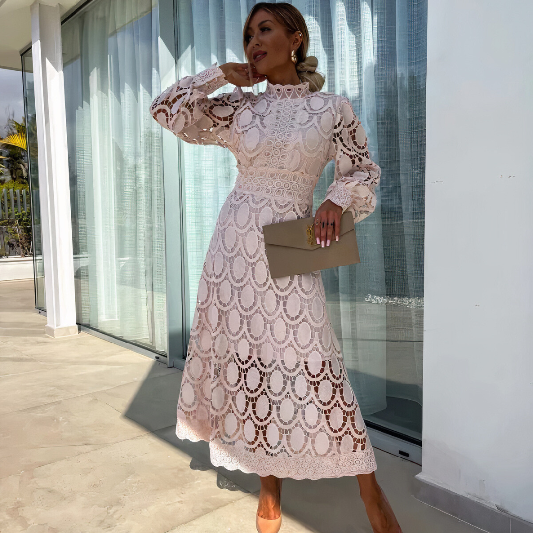 Timeless women's lace midi dress, long sleeves & sheer details, exuding sophistication for evening events.