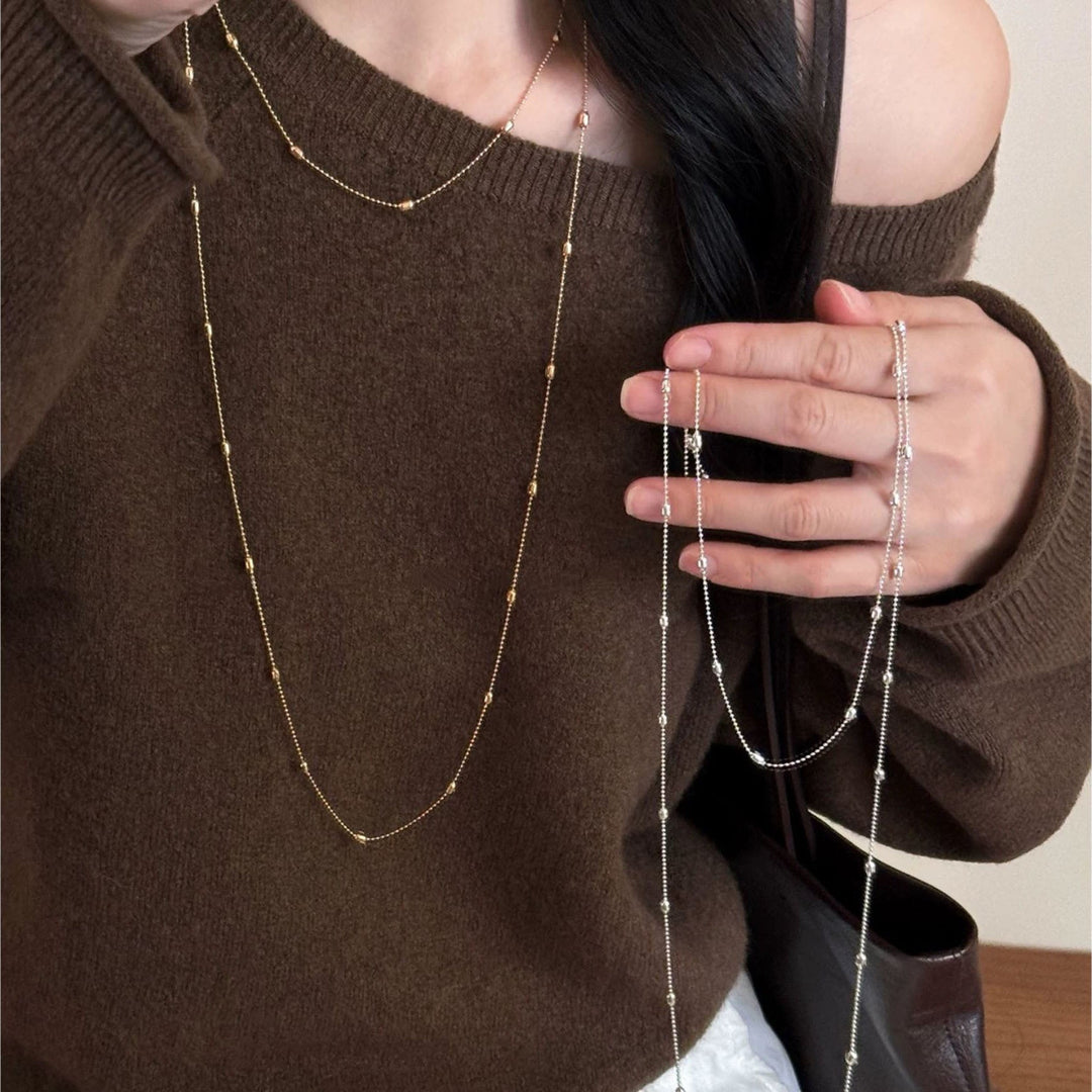 Women's delicate layered chain necklace in silver, perfect for elegant everyday fashion jewelry.