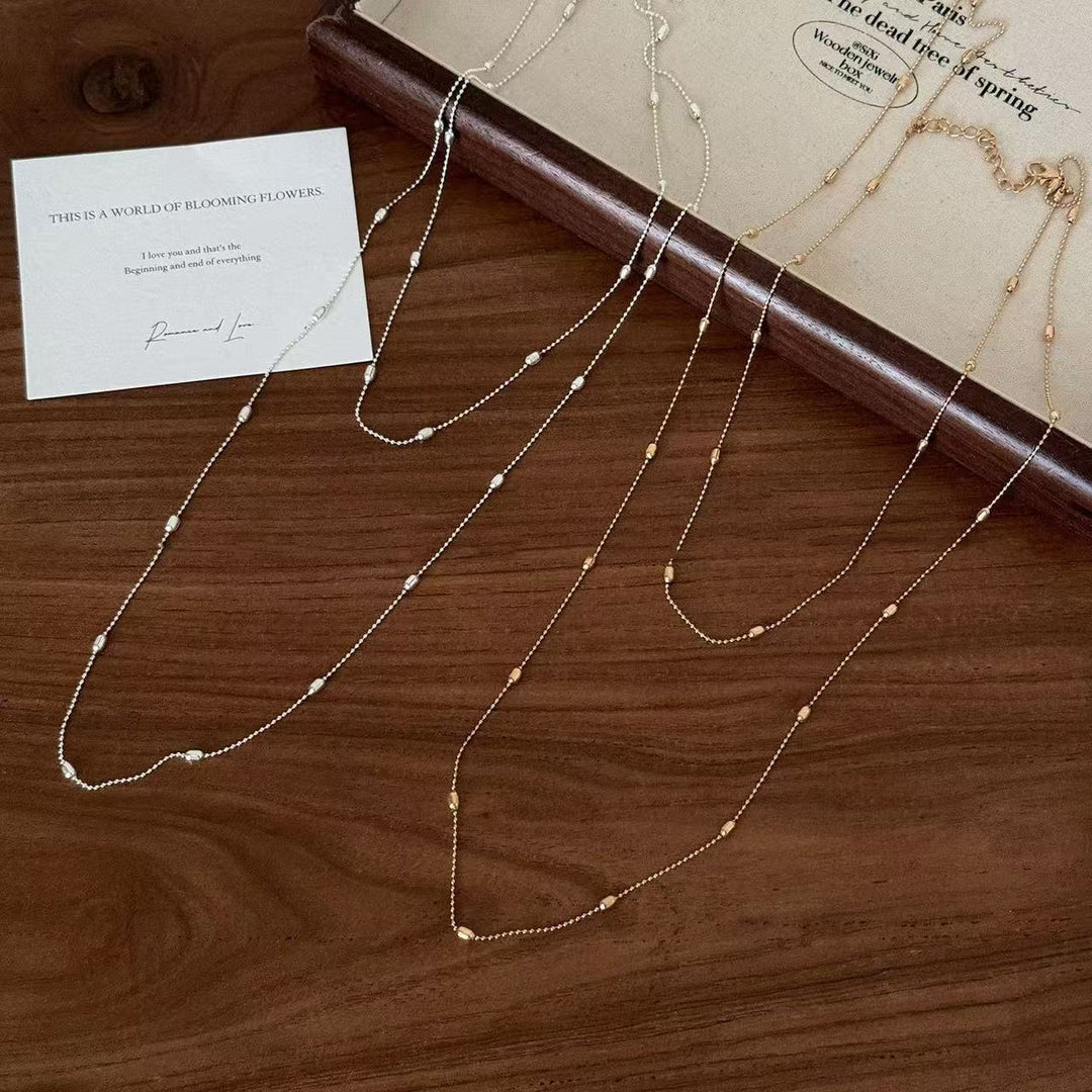 Elegant women's layered chain necklace, delicate and fashionable, ideal for gifts or daily wear.