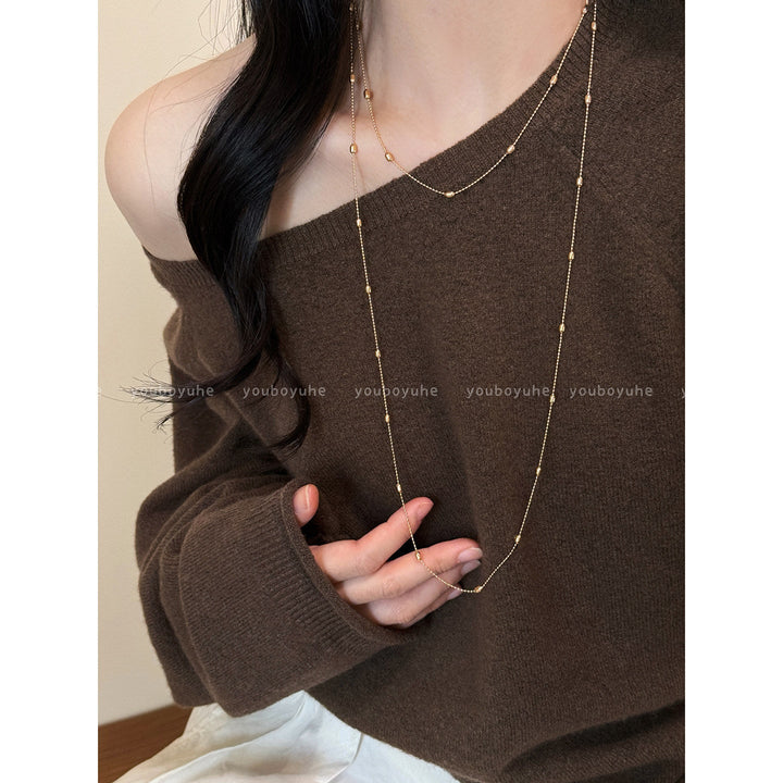 Delicate layered chain necklace for women, an elegant silver or gold jewelry gift for any occasion.
