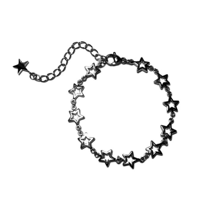 Women's fashion chain bracelet with multiple star accents. Delicate and adjustable, an elegant celestial jewelry gift.