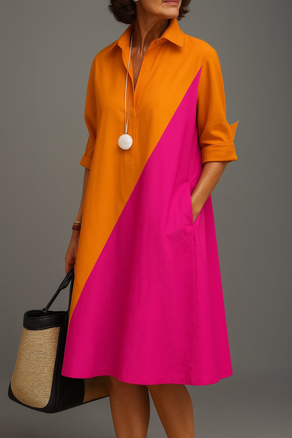Women's diagonal colorblock midi dress with a collar. Chic A-line casual dress featuring a modern geometric pattern.