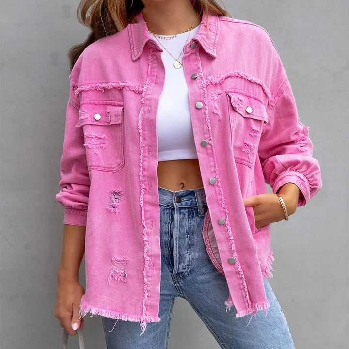 Women's distressed denim jacket with frayed hem & button front. Casual, stylish outerwear.