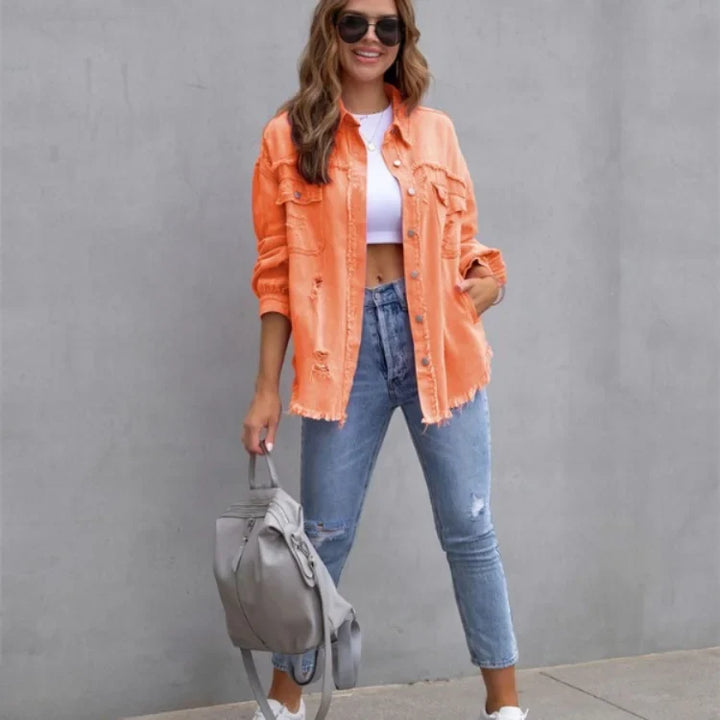 Casual women's distressed jacket with a button front. Features a stylish frayed hem. Great for layering.