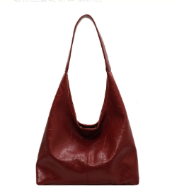 Trendy distressed leather tote bag, a minimalist shoulder bag for women with magnetic clasp.