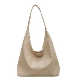 Minimalist distressed leather tote, perfect for everyday carry with secure magnetic closure.