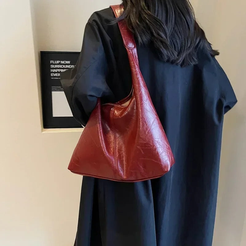 Authentic distressed leather tote bag, a stylish women's shoulder bag with magnetic snap.