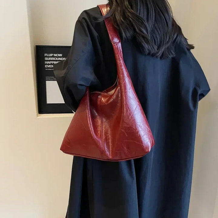 Authentic distressed leather tote bag, a stylish women's shoulder bag with magnetic snap.